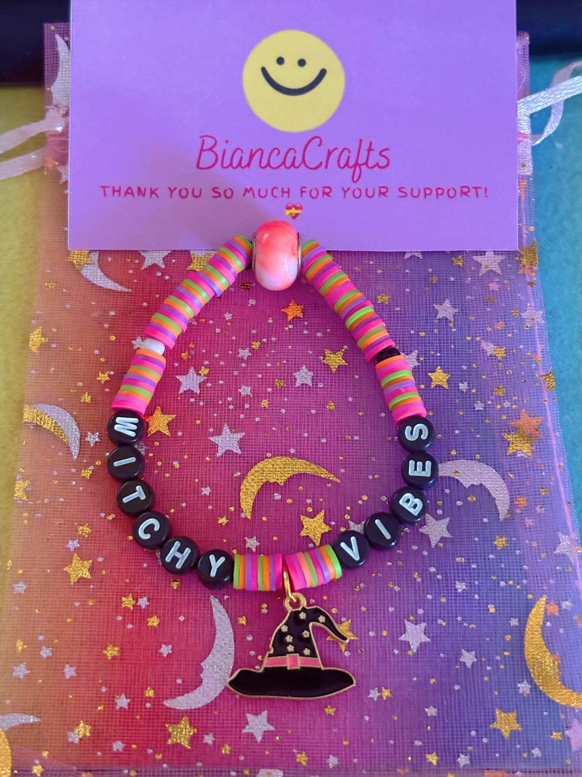 Stretchy Clay Beaded- Witchy Vibes Black Lettering with Witch Hat Charm