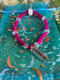 Stretchy Pink Glass Beaded- “Strength Is Beautiful” Charm