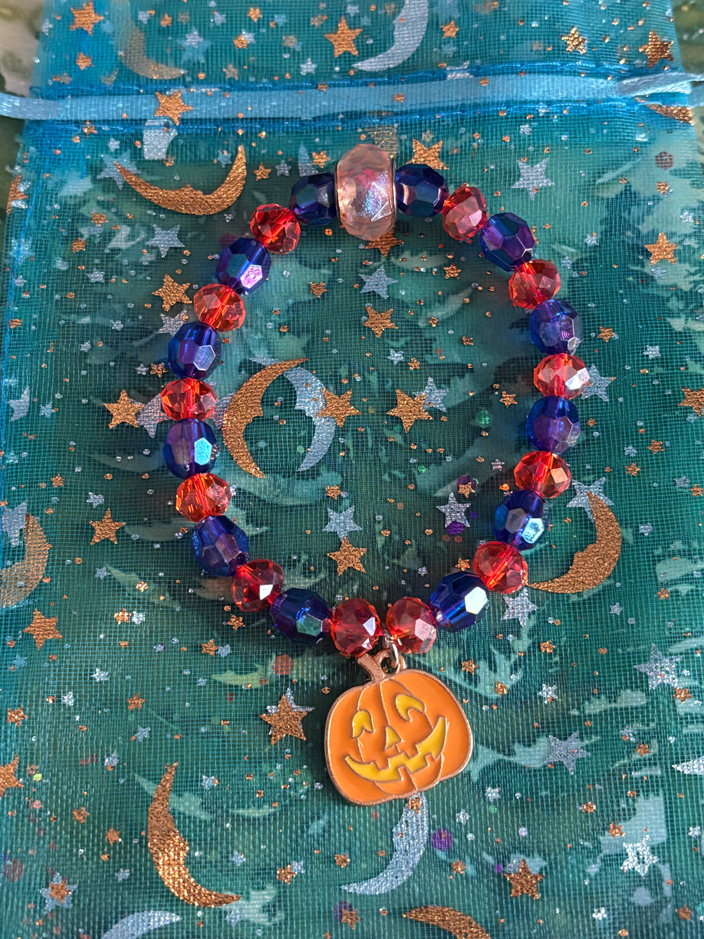 Stretchy Glass Dark Blue and Orange Beaded- Orange Smiling Pumpkin